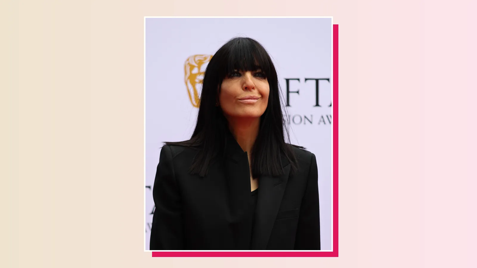 Claudia Winkleman smiling on the red carpet at the BAFTA TV Awards