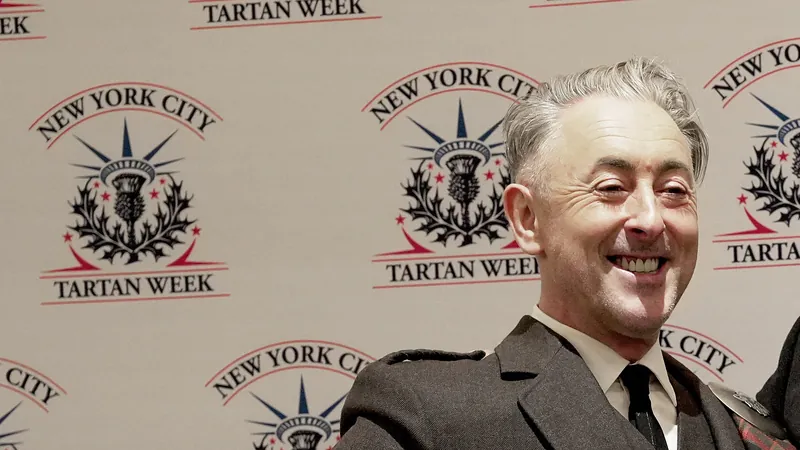 The Traitors US host Alan Cumming smiling at a New York City Tartan Week event